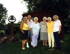 Joan (Joanne) Dorrough, George Dorrough, Thelma Fry, Joy Sayger, Marie, Julia (Judy) Dorrough, George s backyard,